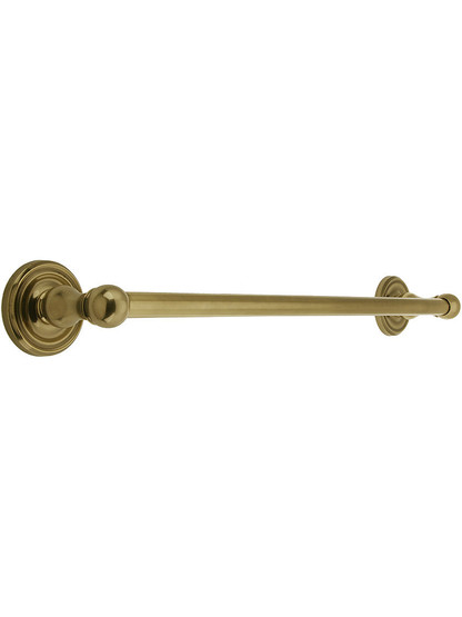 18 inch Brass Towel Bar with Classic Rosettes in Antique Brass.